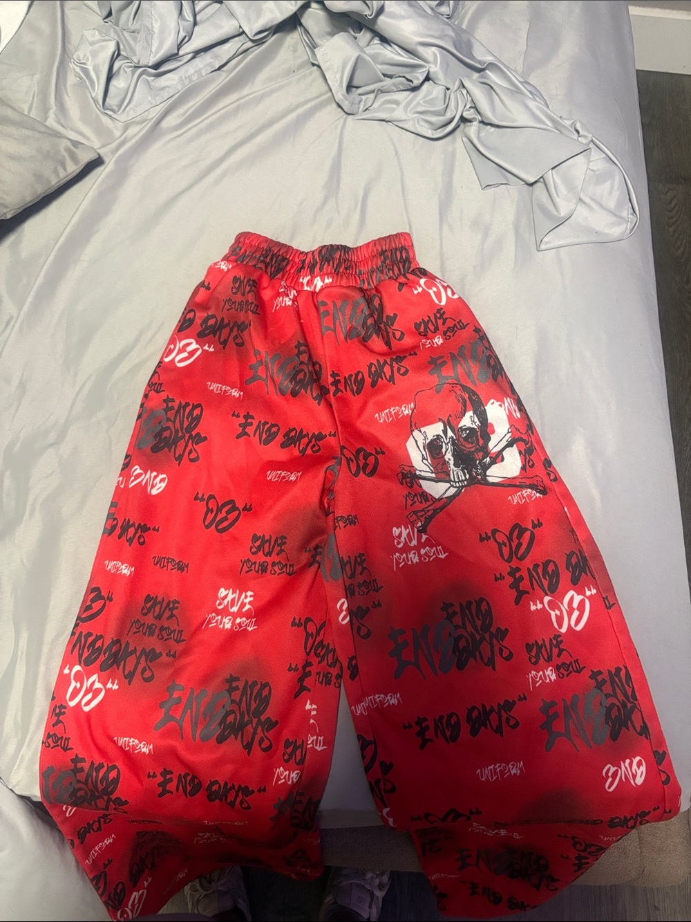 Women’s red and black sweat pants